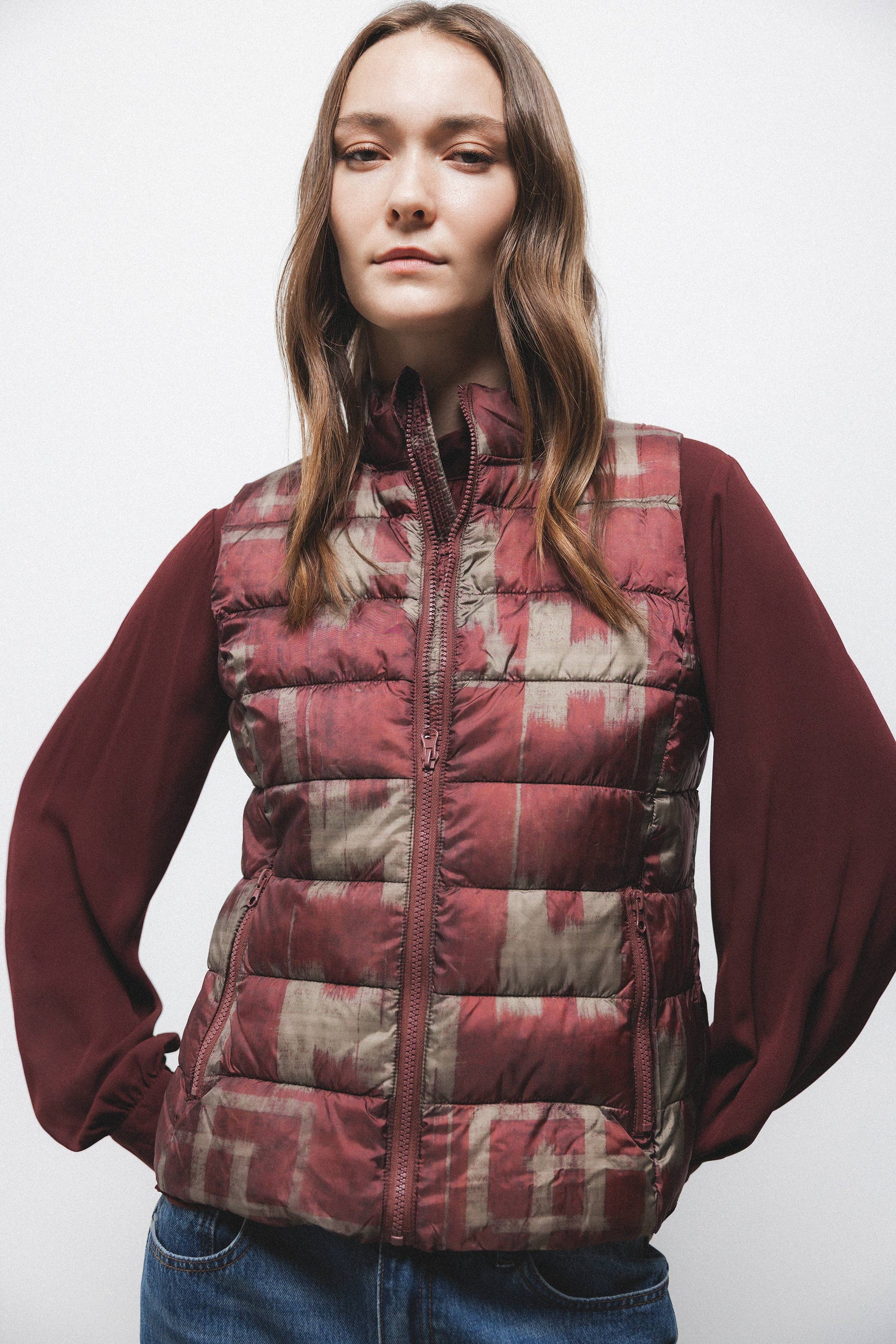 Gilet trapuntato con collo alto