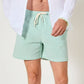 Costume da bagno a righe Sunrise verde