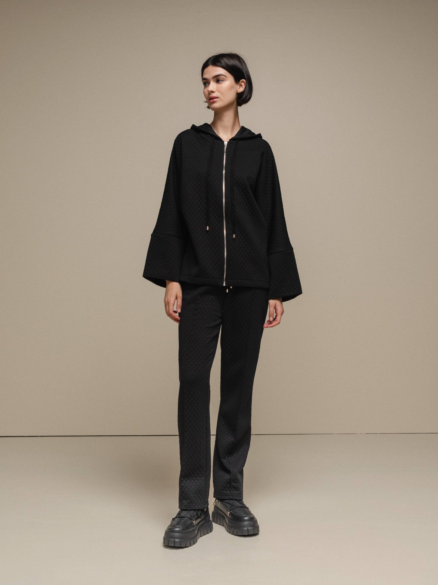 Cappotto donna trapuntato con cappuccio e zip