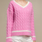 Maglione donna a trecce con scollo a V