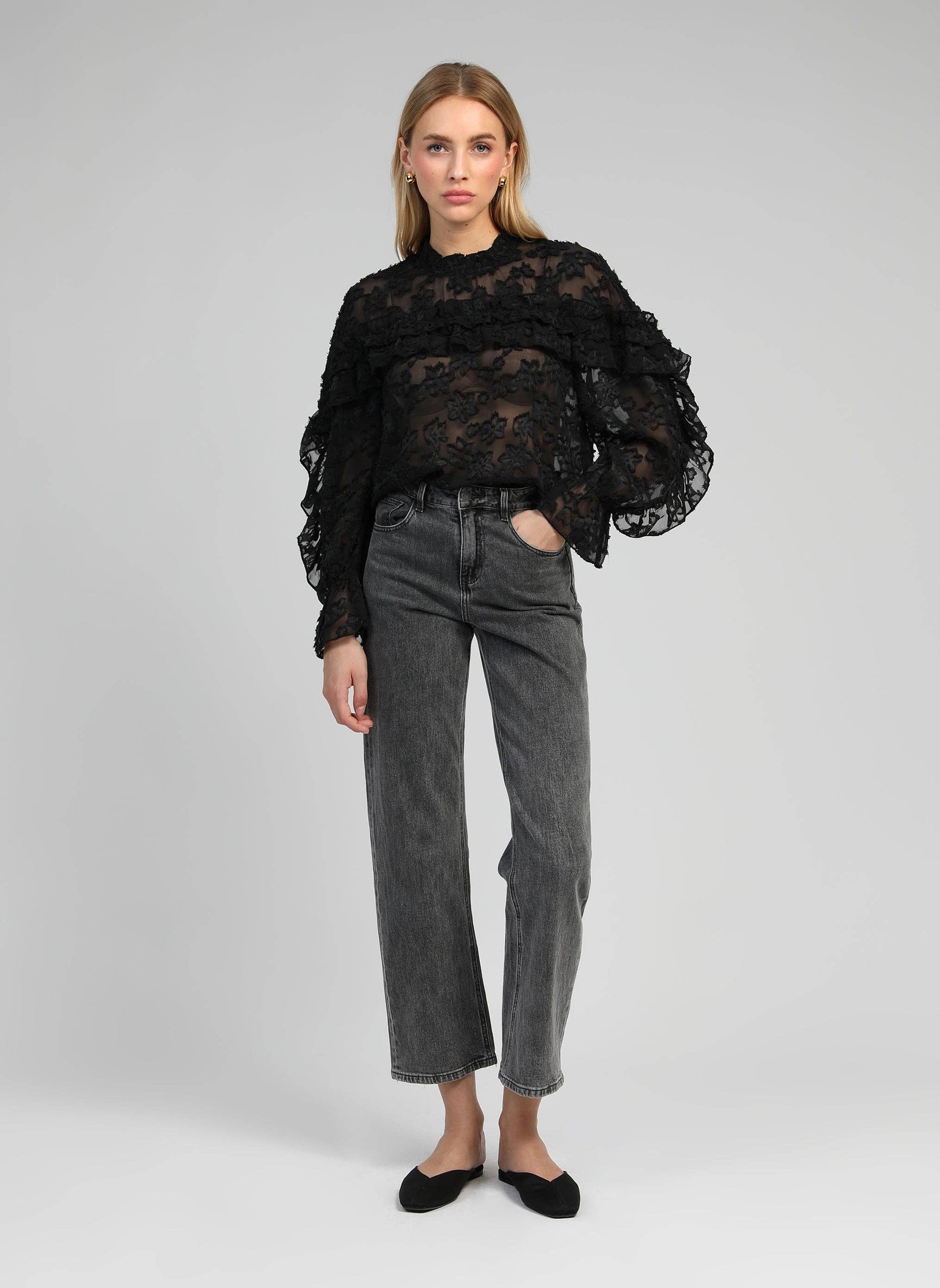 Blusa trasparente jacquard con volant