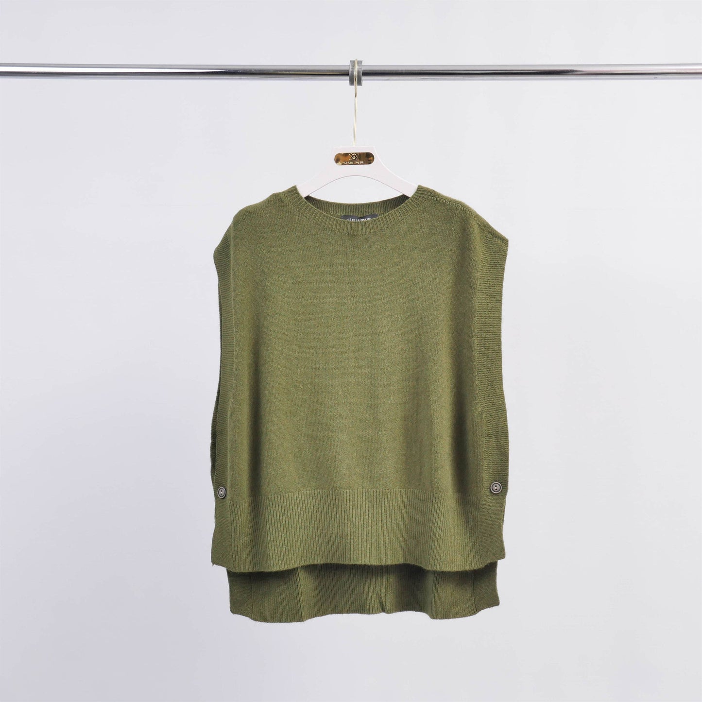 Poncho senza maniche in maglia strutturata con girocollo