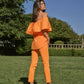 Top off-shoulder con volant in popeline