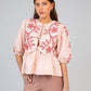 Blusa Santaya rosa con ricami e fiocchi