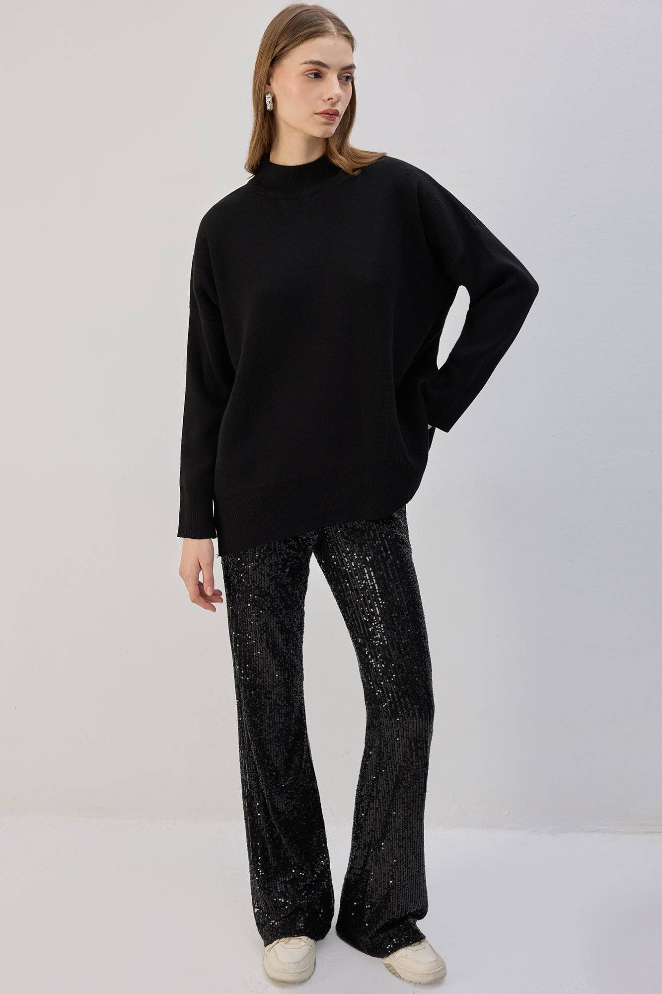 Pantaloni a zampa con paillettes
