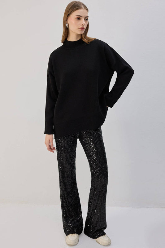 Pantaloni a zampa con paillettes