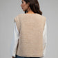 Cardigan smanicato in maglia beige