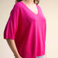 Maglione in viscosa seamless con scollo a V e lavorazione 3D