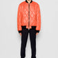 Bomber trapuntato a rombi arancione con zip