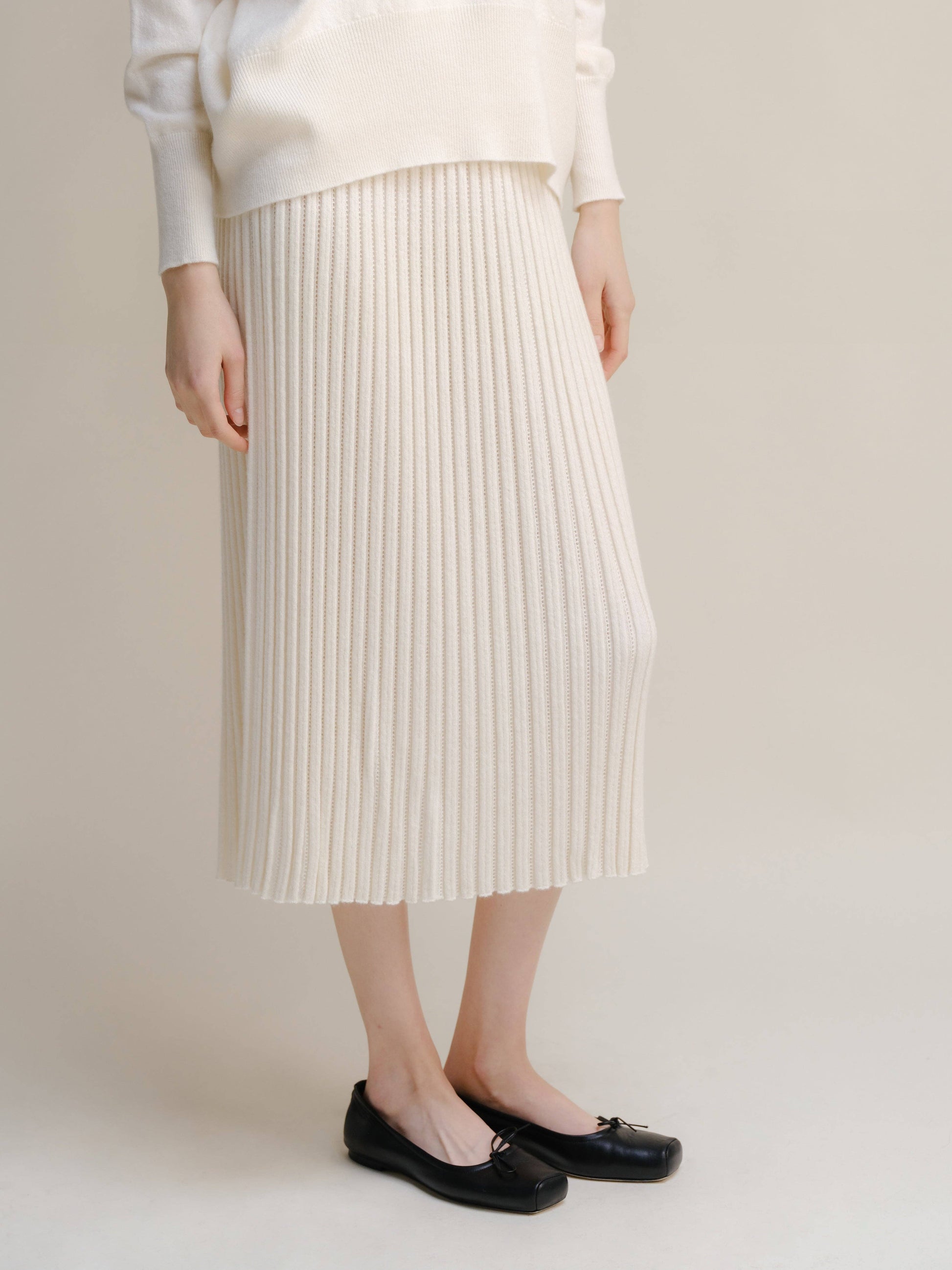 Gonna traforata in misto cashmere con maglia 3D