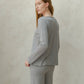 Maglione in lana merino extrafine con scollo a barchetta a maglia 3D