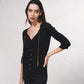 Cardigan in maglia a coste con catene dorate