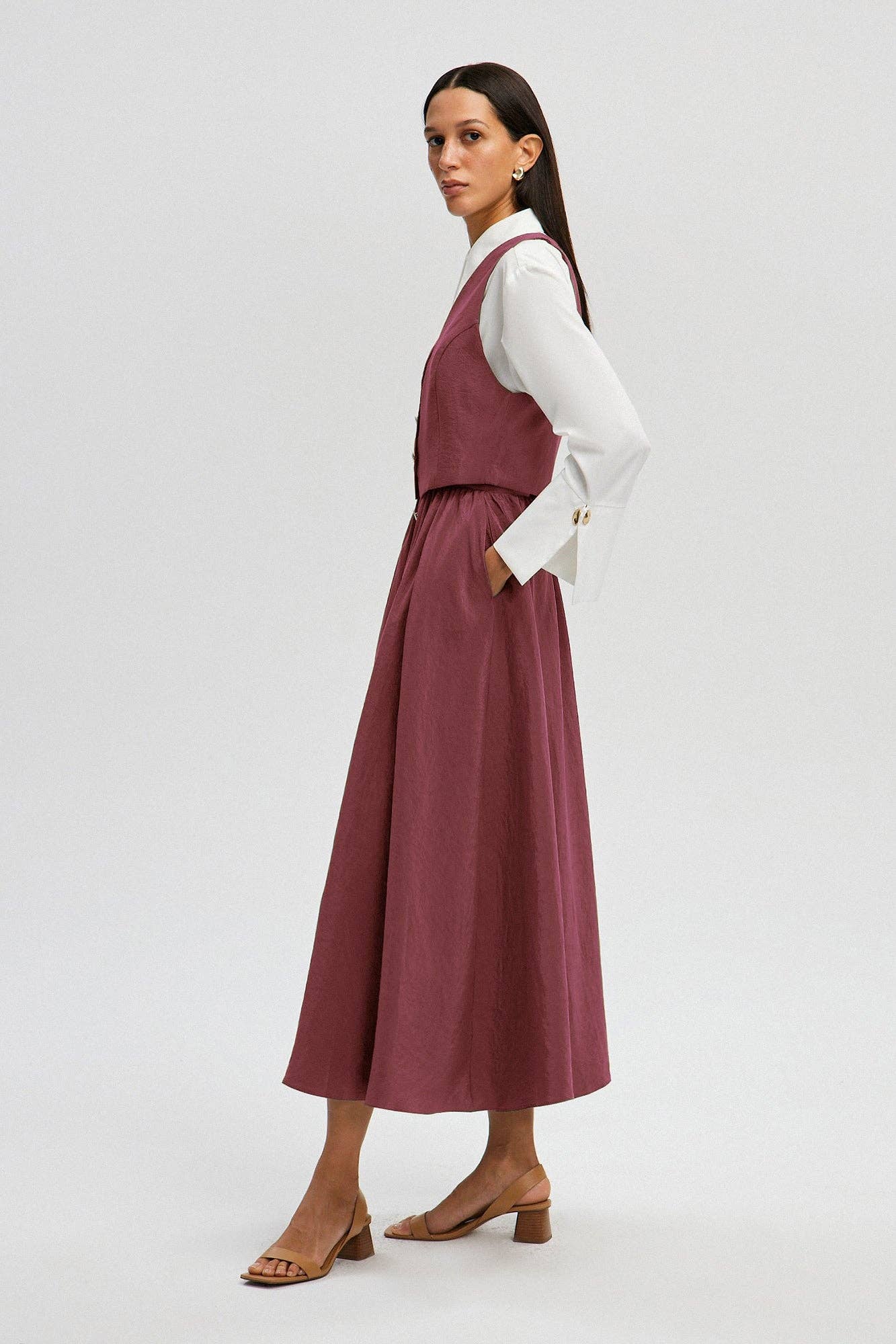 Set gilet e gonna midi in cupro rosa