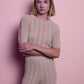 Top in maglia lurex con dettagli ad anelli