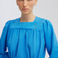 Camicia effetto lino martellato con arricciature
