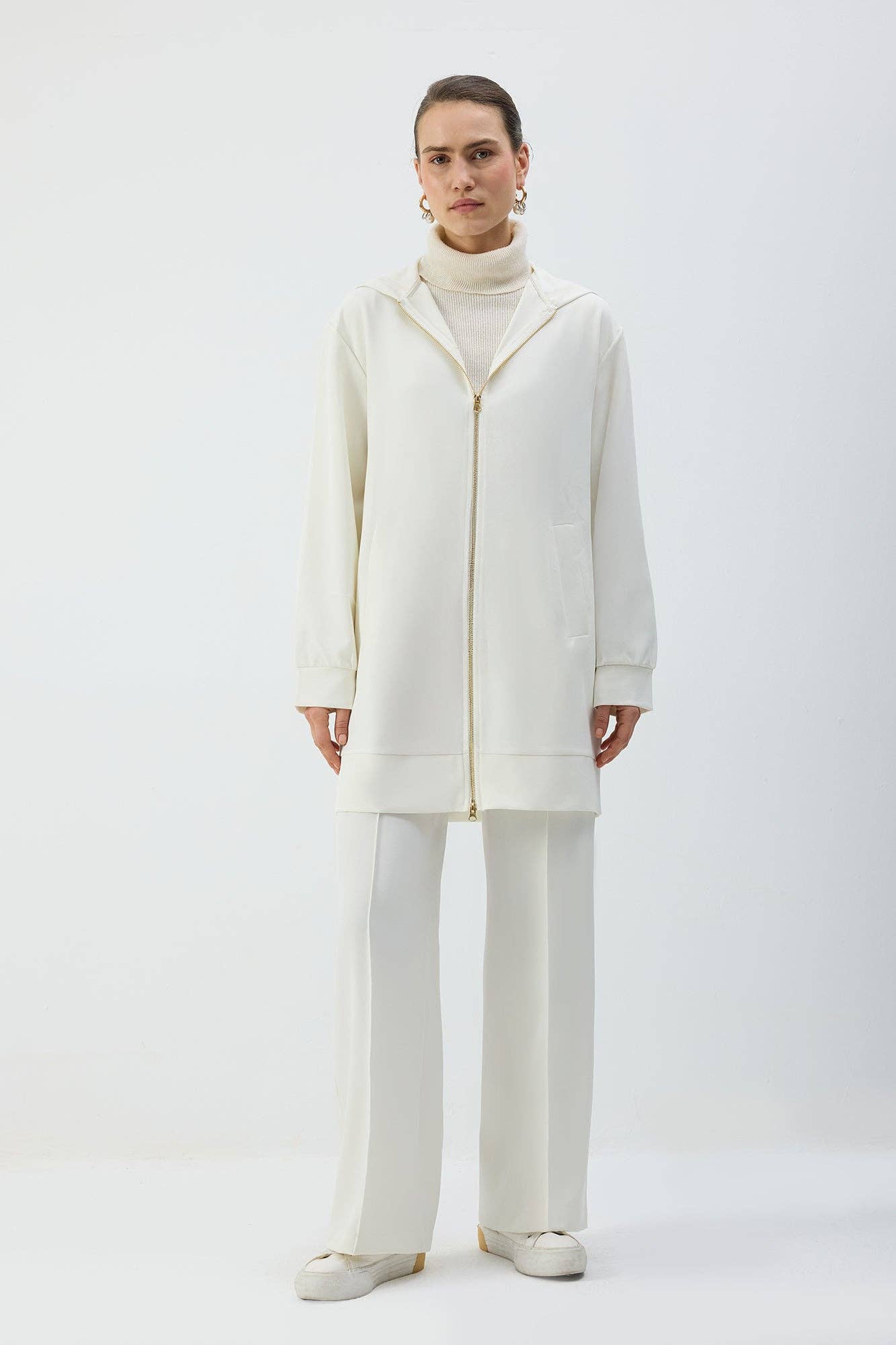 Giacca lunga con cappuccio e zip