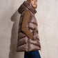Gilet imbottito lungo con cappuccio da donna