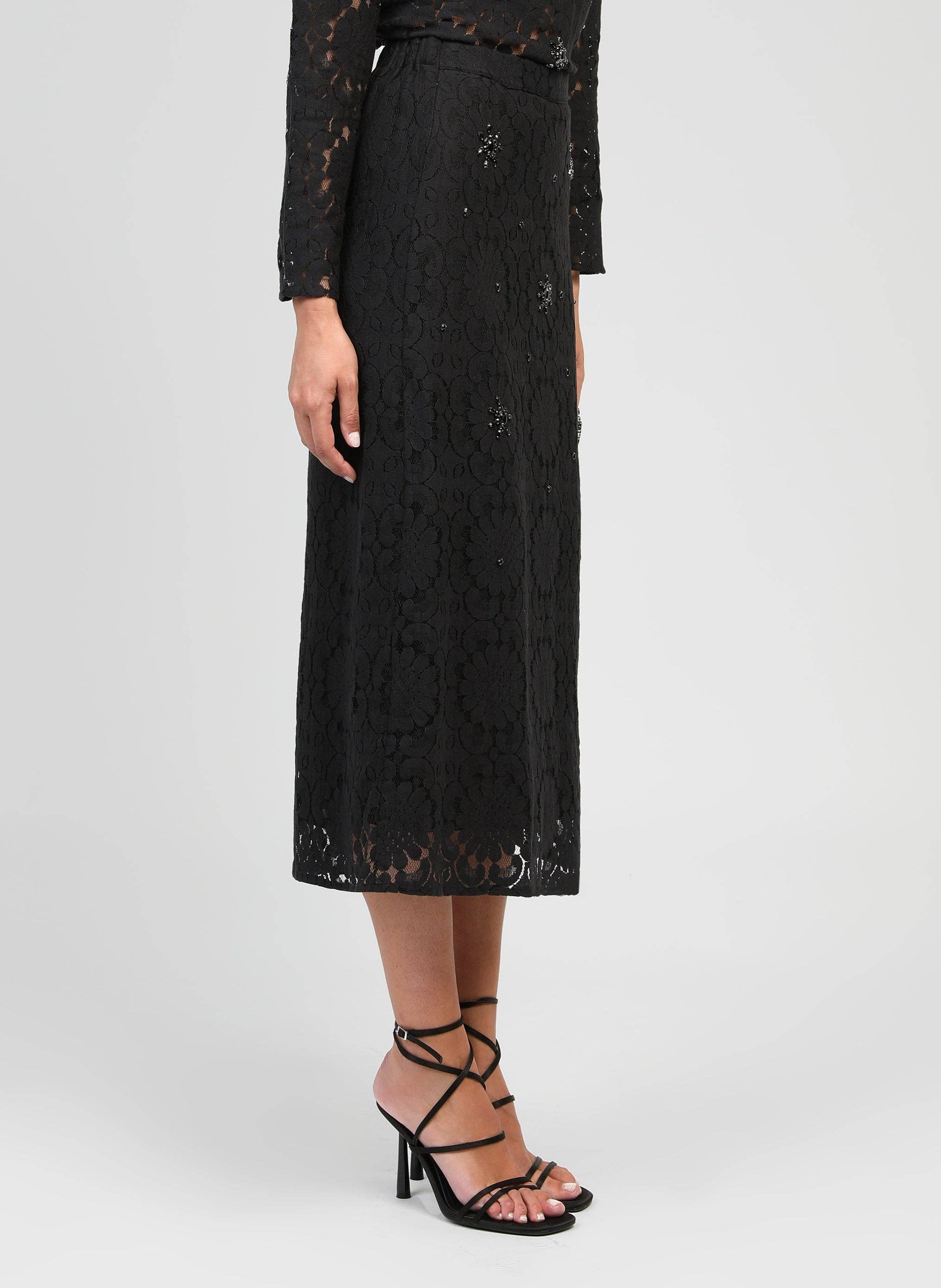 Gonna midi in pizzo nero con ricami di strass e perle