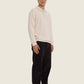 Maglione polo beige in cotone organico
