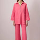 Completo tunica in crêpe rosa con zip e pantaloni svasati