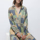 Abito stampato patchwork con volant