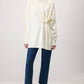 Tunica in maglia con accessorio metallico