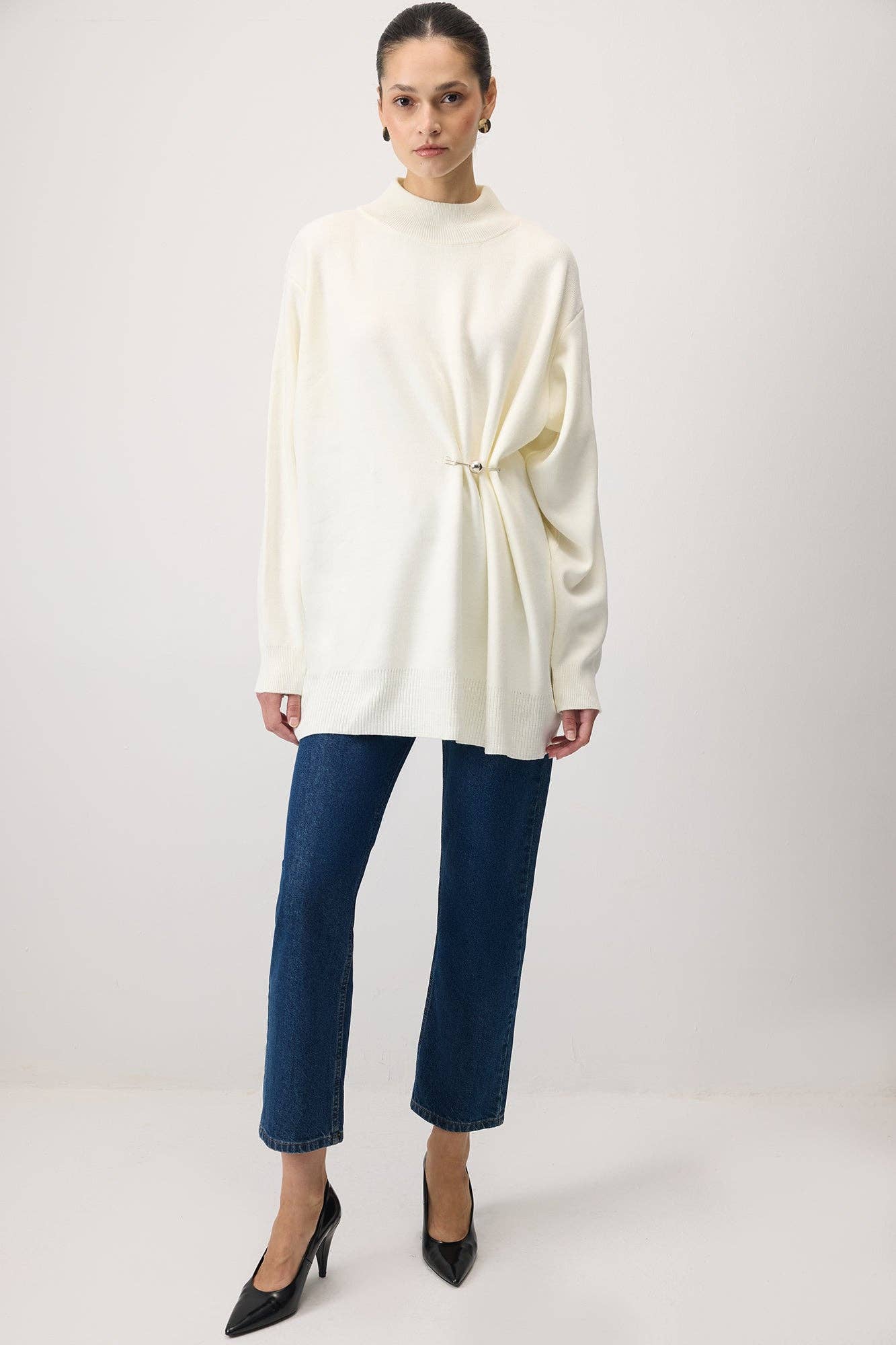 Tunica in maglia con accessorio metallico
