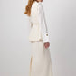 Gilet aderente crema con bottoni dorati
