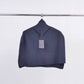 Poncho maglione in maglia a coste con collo alto