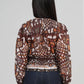 Blusa in organza stampata caramello