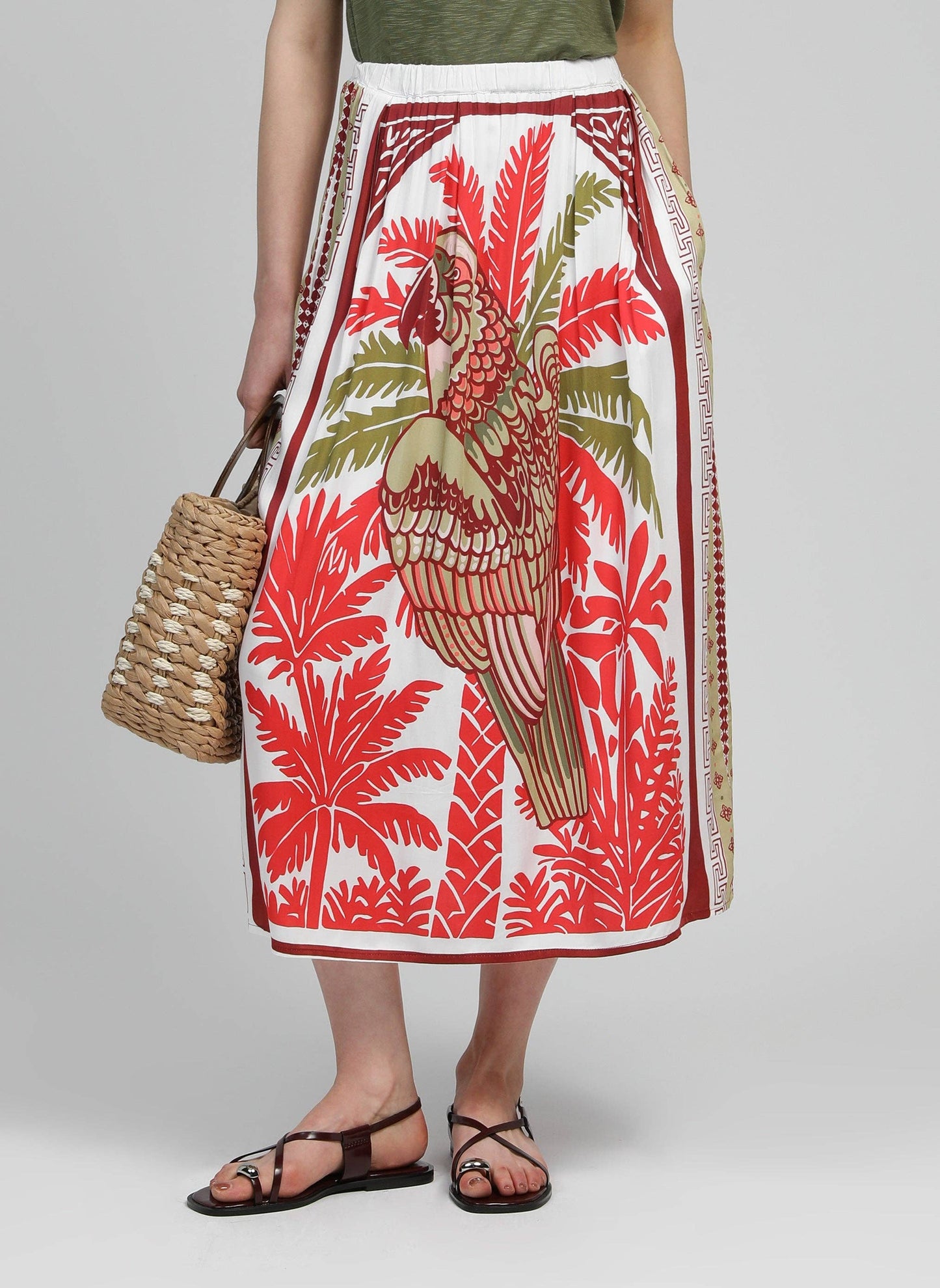 Gonna midi a vita alta con stampa pappagallo rossa