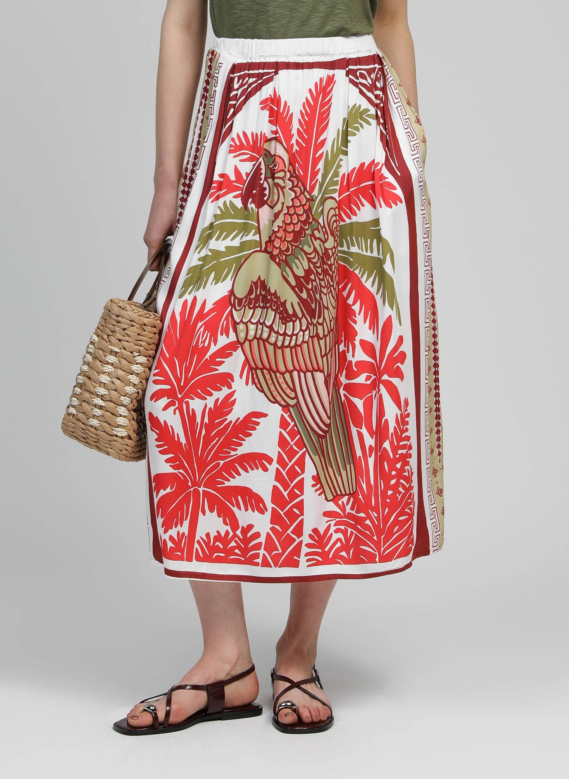 Gonna midi a vita alta con stampa pappagallo rossa