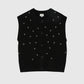 Cardigan smanicato Nolwen nero con ricamo di perle