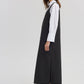 Abito salopette nero con spalline strutturate