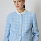 Completo in tweed di cotone con giacca corta e gonna midi