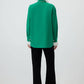 Camicia verde con ricami e dettagli gioiello