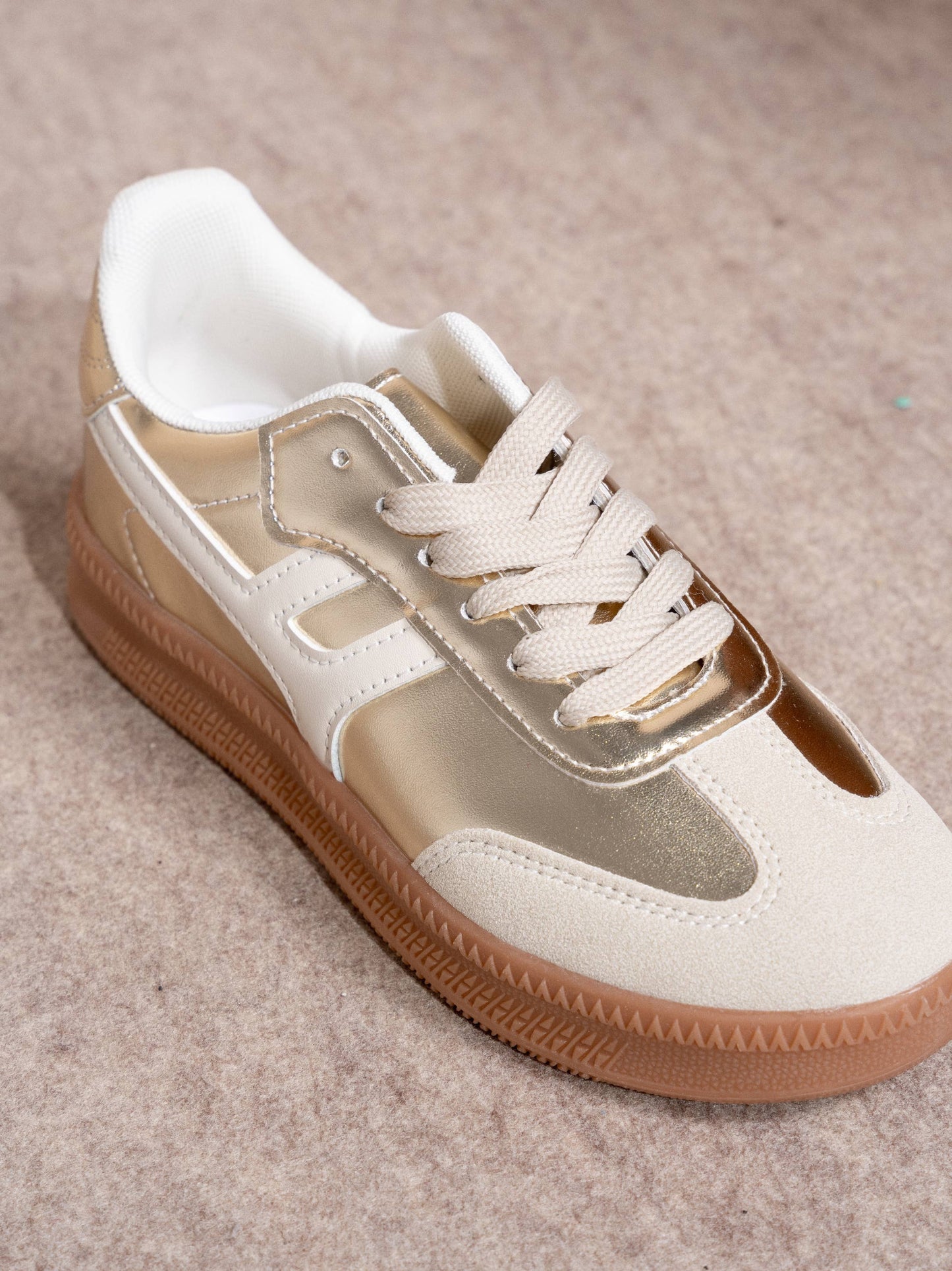 Sneakers donna metallizzate oro con suola in gomma