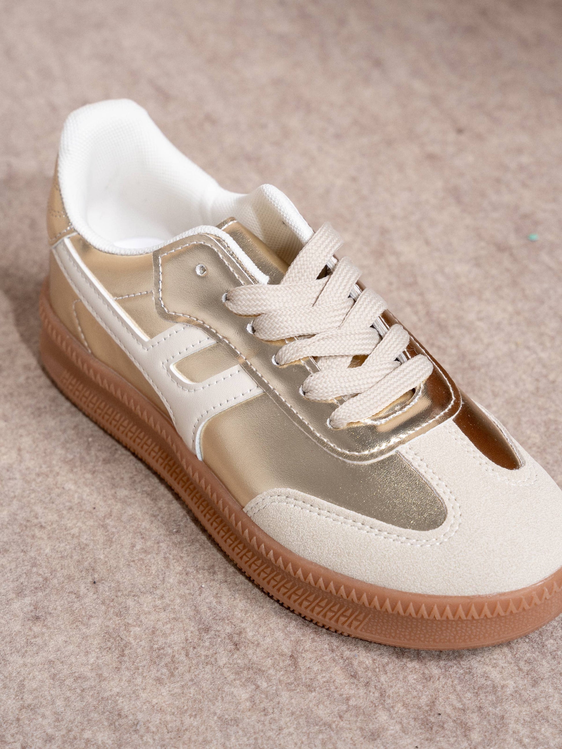 Sneakers donna metallizzate oro con suola in gomma