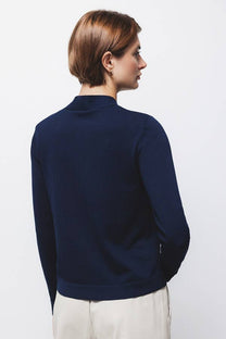 Maglione in maglia rasata con fiocco e scollo a V