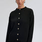 Cardigan in maglia con frange e bottoni