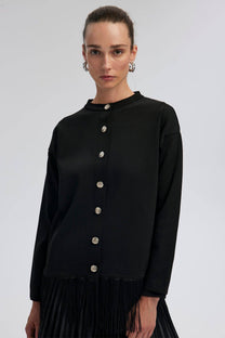 Cardigan in maglia con frange e bottoni