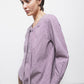 Blusa a quadretti con fiocco e bottoni a contrasto