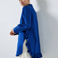 Camicia lunga indaco con orlo a balze