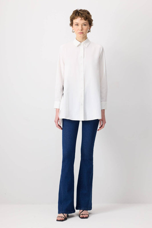 Camicia in popeline con zip e volant sul retro