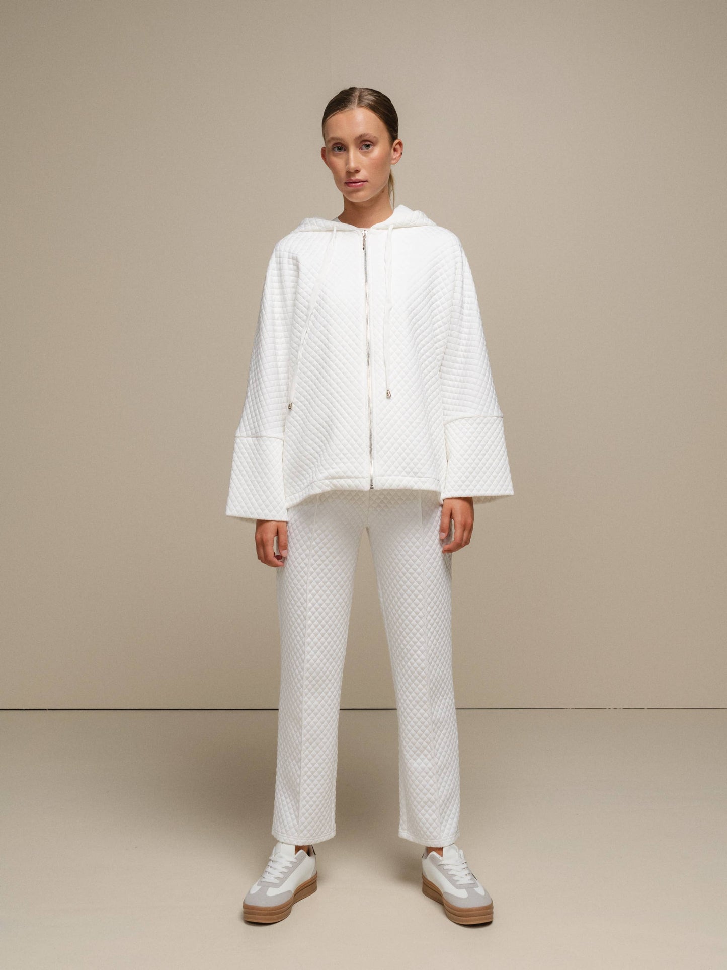 Cappotto donna trapuntato con cappuccio e zip