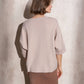 Maglia ampia in maglia con bottoni sulle maniche