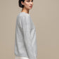 Maglione in maglia con scollo a V e micro paillettes