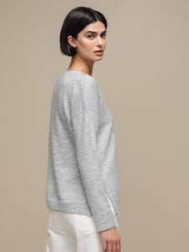 Maglione in maglia con scollo a V e micro paillettes
