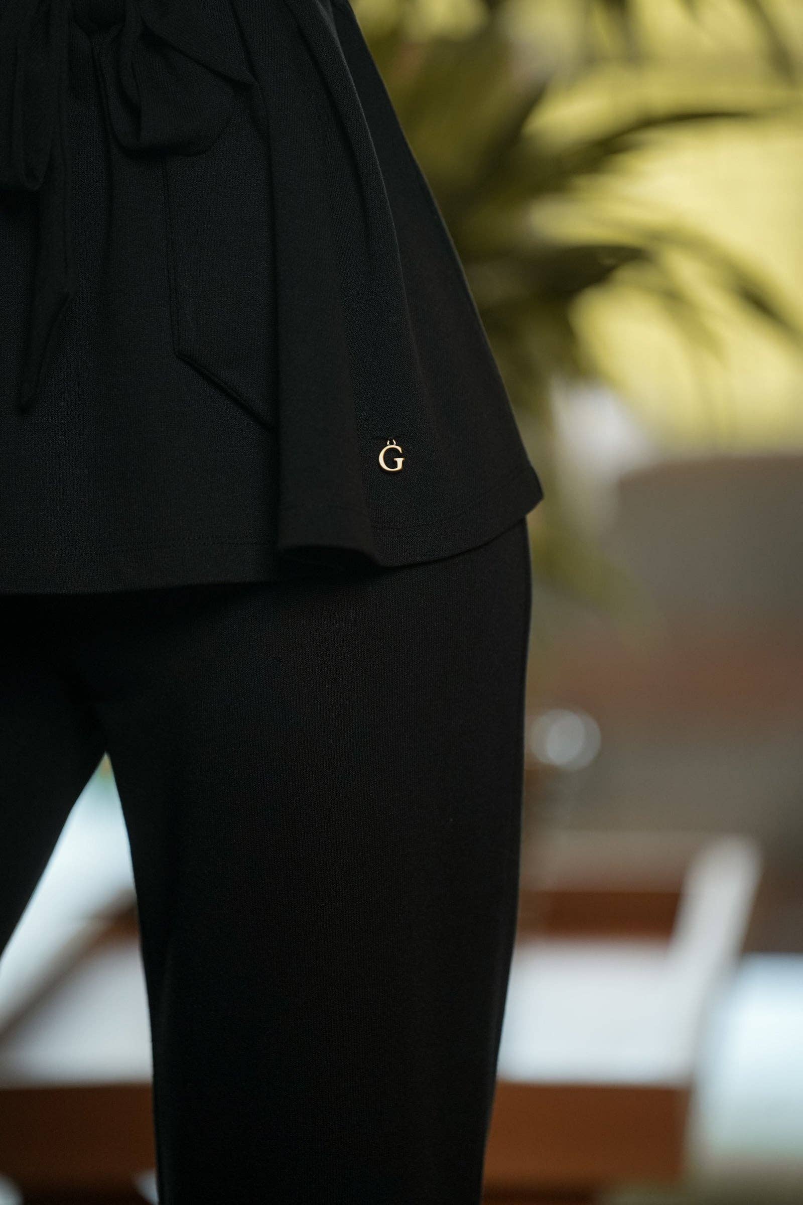 Pantaloni a zampa in maglia elasticizzata