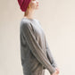 Maglia girocollo in misto cashmere con scollo curl